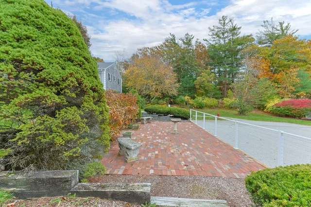 a view of a street with a building in the background