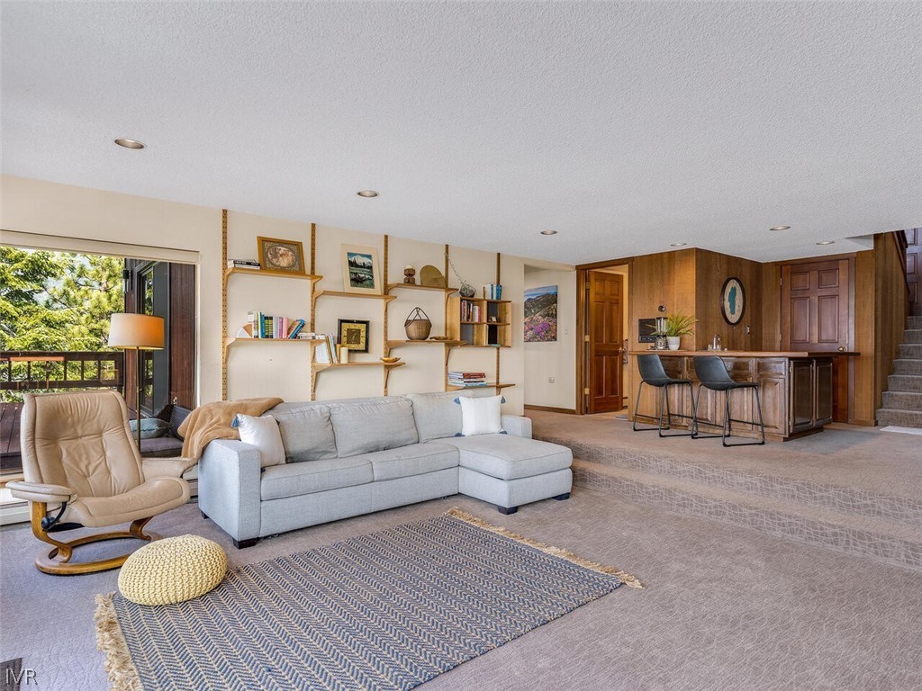 751 Champagne Road Incline Village, NV 89451 - Photo 16 of 30 a living room with furniture and a table