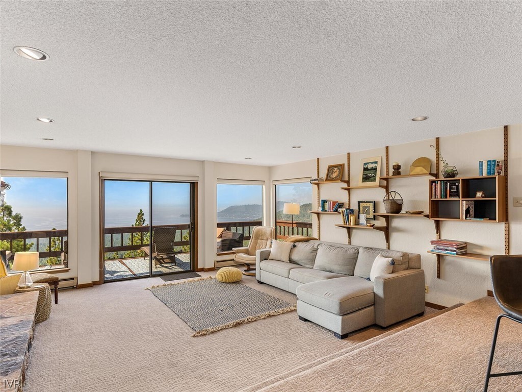 751 Champagne Road Incline Village, NV 89451 - Photo 17 of 30 a living room with furniture and a table