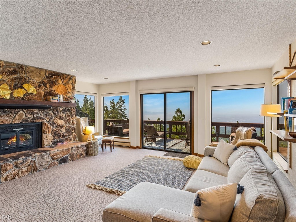 751 Champagne Road Incline Village, NV 89451 - Photo 18 of 30 a living room with furniture and a fireplace