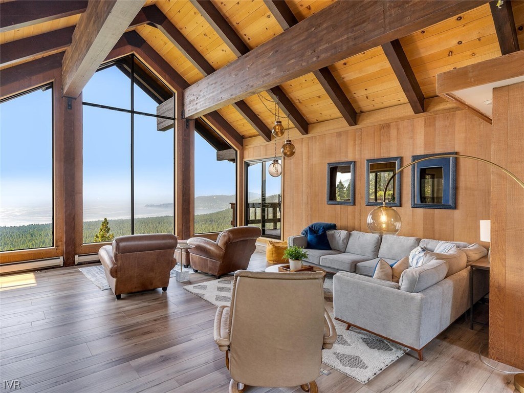 751 Champagne Road Incline Village, NV 89451 - Photo 2 of 30 a living room with furniture and floor to ceiling windows