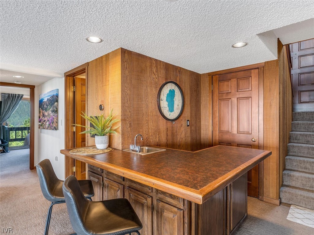 751 Champagne Road Incline Village, NV 89451 - Photo 23 of 30 a kitchen with a table and chairs in it