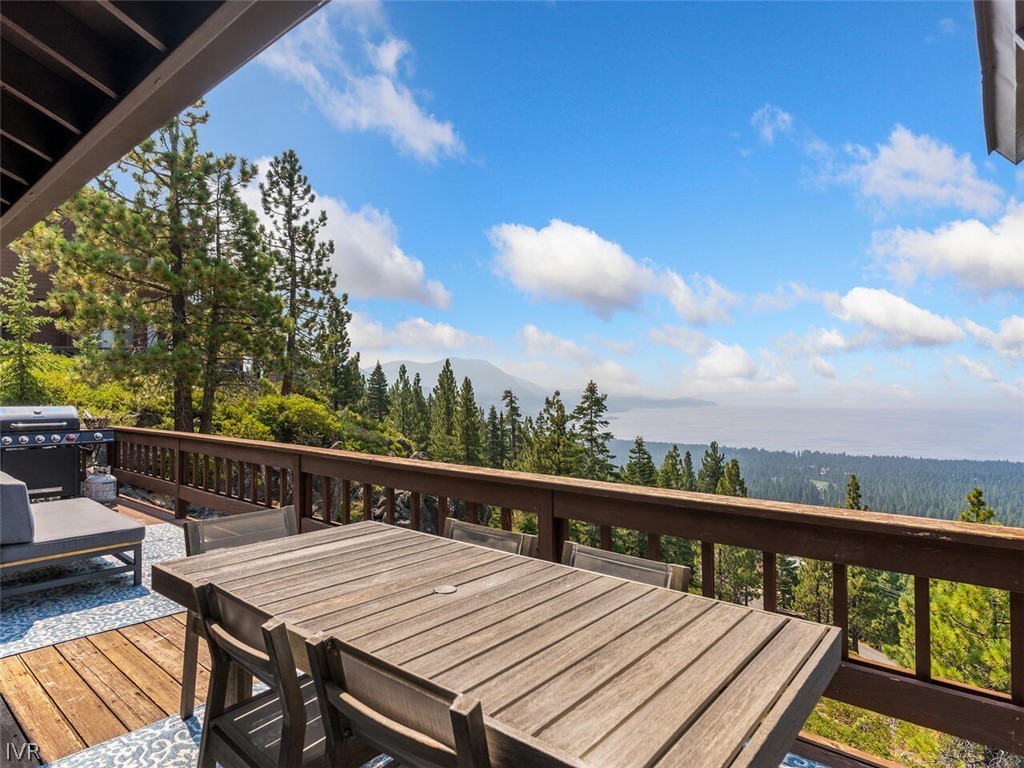 751 Champagne Road Incline Village, NV 89451 - Photo 25 of 30 a view of a balcony with wooden floor and outdoor seating