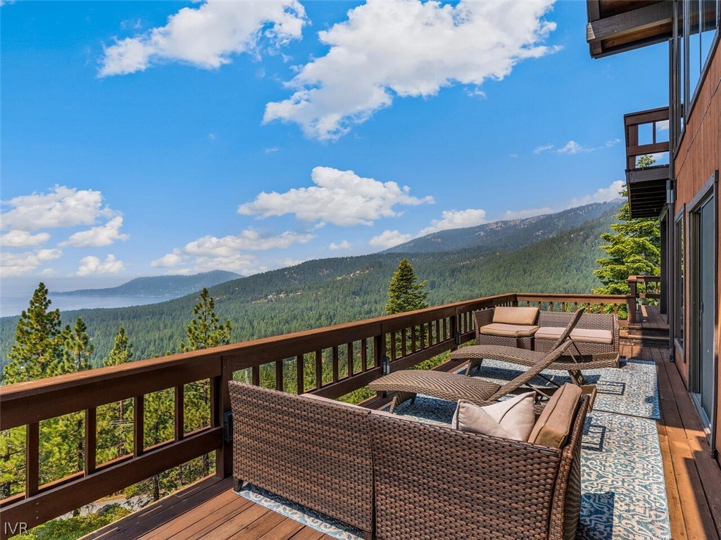 751 Champagne Road Incline Village, NV 89451 - Photo 28 of 30 a view of a balcony with wooden benches