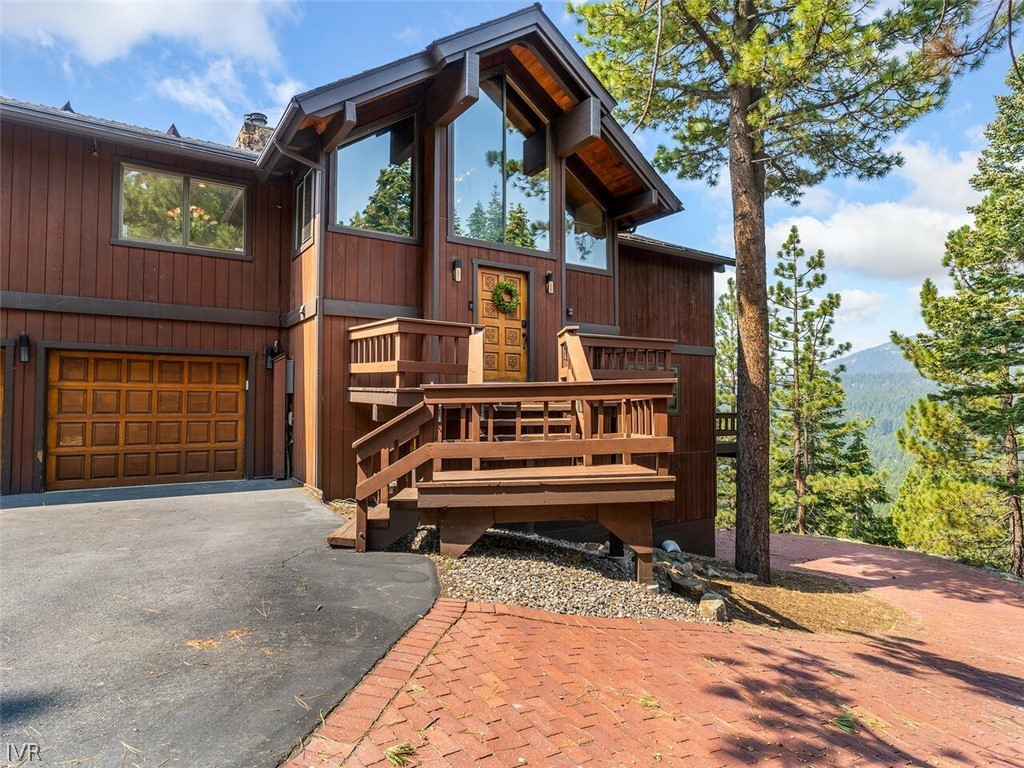 751 Champagne Road Incline Village, NV 89451 - Photo 30 of 30 a front view of house with a garden