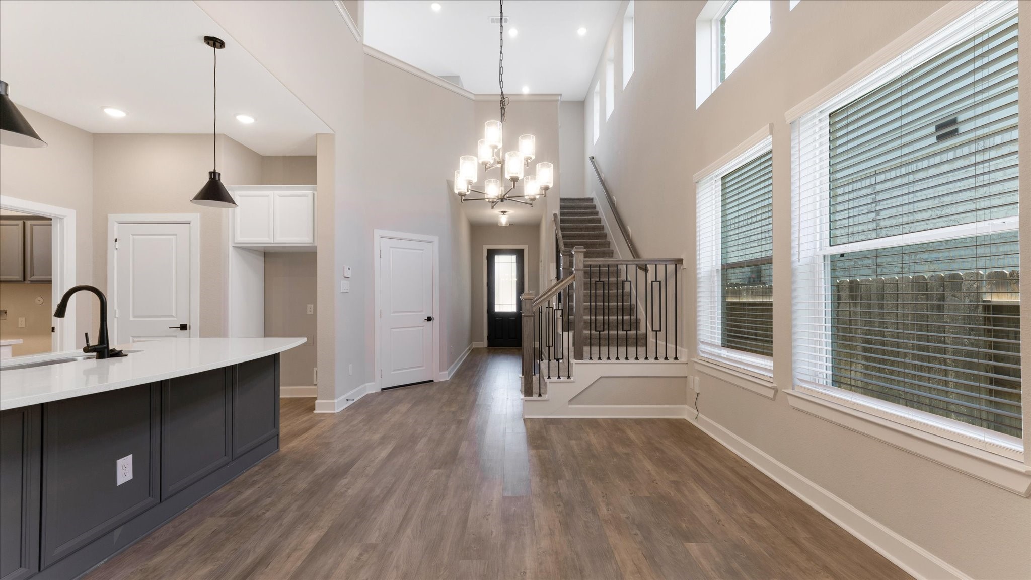 15607 Rising Wren Court Conroe, TX 77302 - Photo 39 of 40 a view of a hallway with wooden floor and a large windows