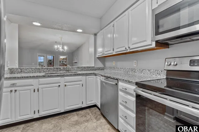 $400,000 | 207 Queen Elizabeth Avenue, Unit 17, Manteo, NC 27954