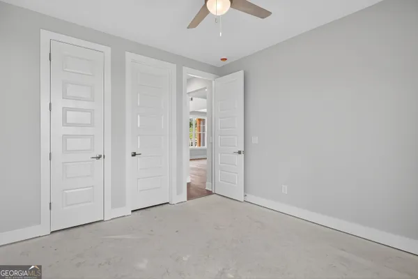 a view of a hallway with staircase