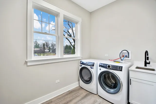 a utility room with dryer and washer
