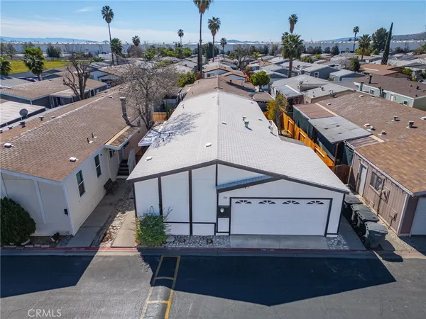 a view of a terrace with outdoor seating and city view