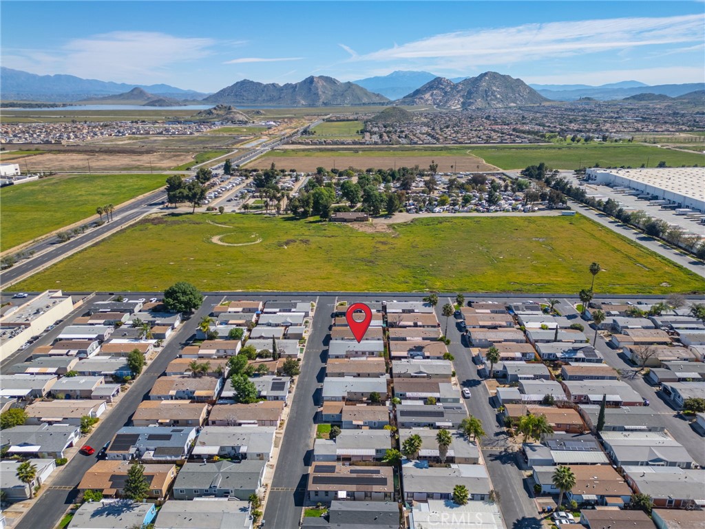 80 East Dawes Street, Unit 126 Perris, CA 92571 - Photo 39 of 39 an aerial view of residential building and lake view