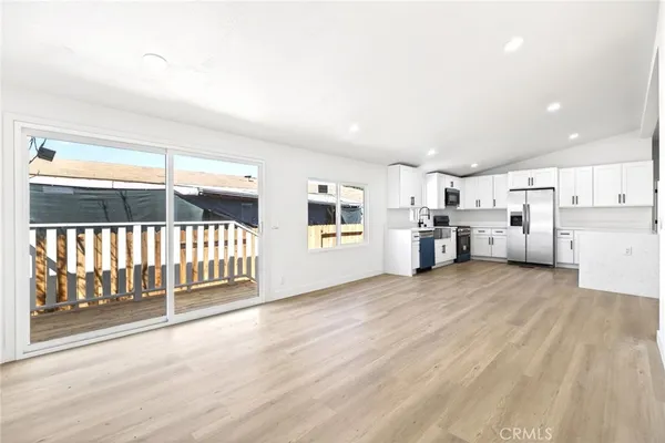 a view of a kitchen with a sink