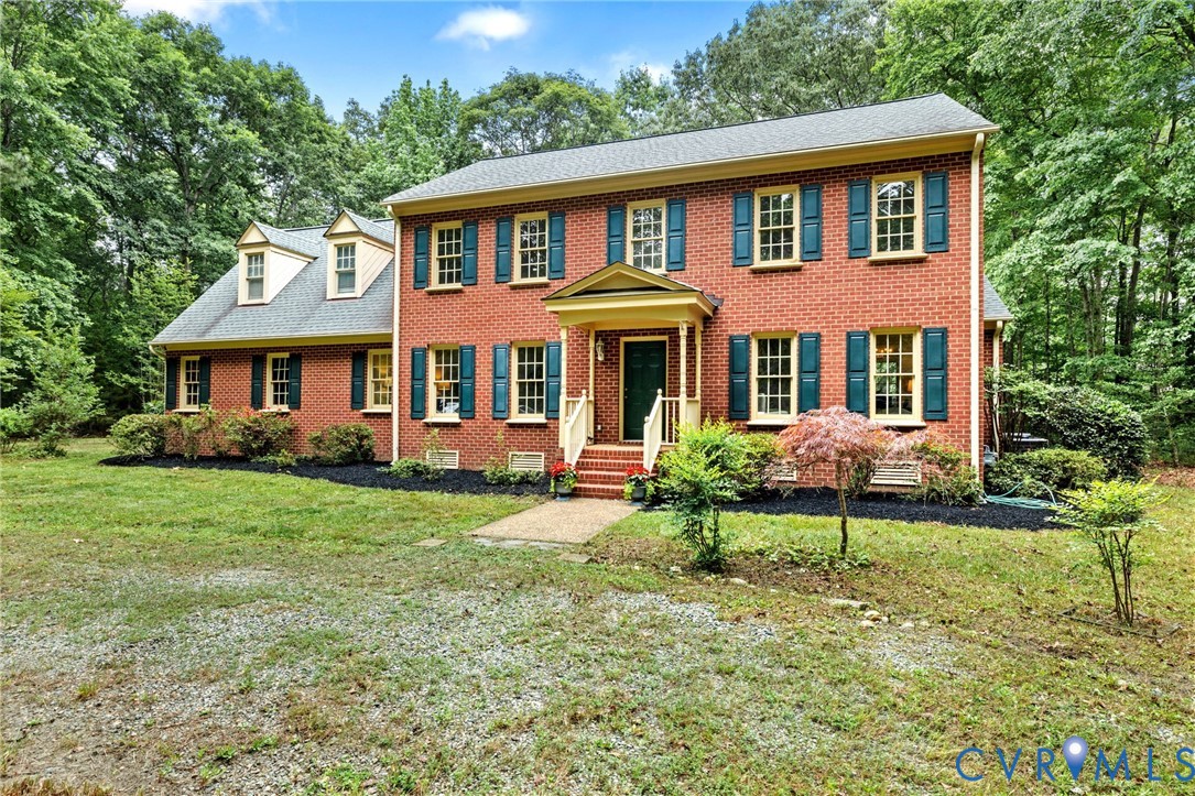 2615 Salisbury Road Midlothian, VA 23113 - Photo 32 of 36 a front view of a house with a yard
