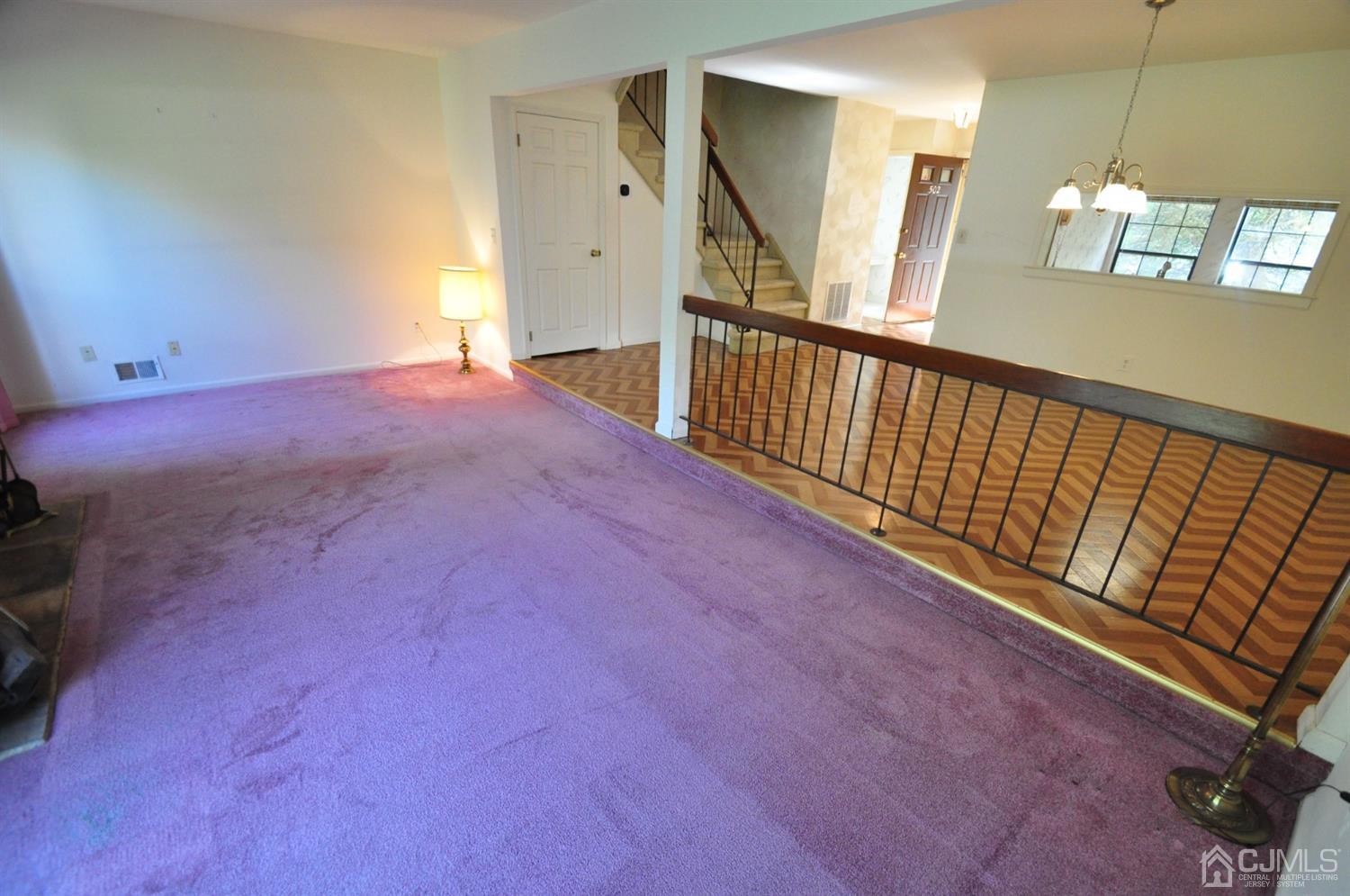 502 Timber Oaks Road Edison, NJ 08820 - Photo 14 of 21 a view of a hallway with a window
