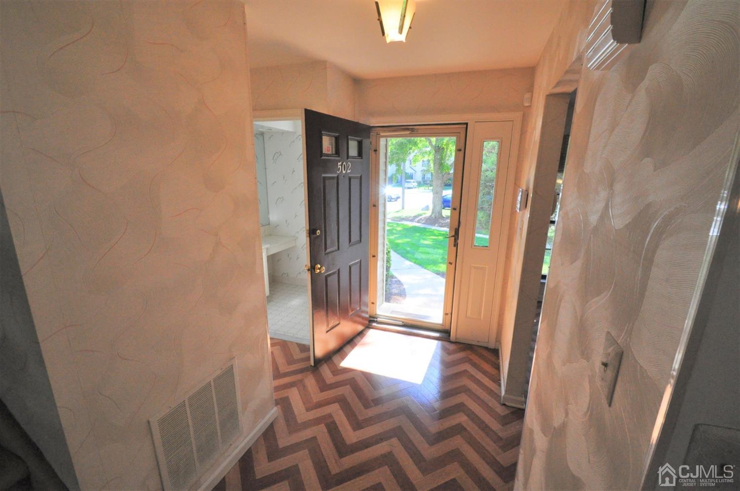 502 Timber Oaks Road Edison, NJ 08820 - Photo 6 of 21 a view of entryway with a floor to ceiling window