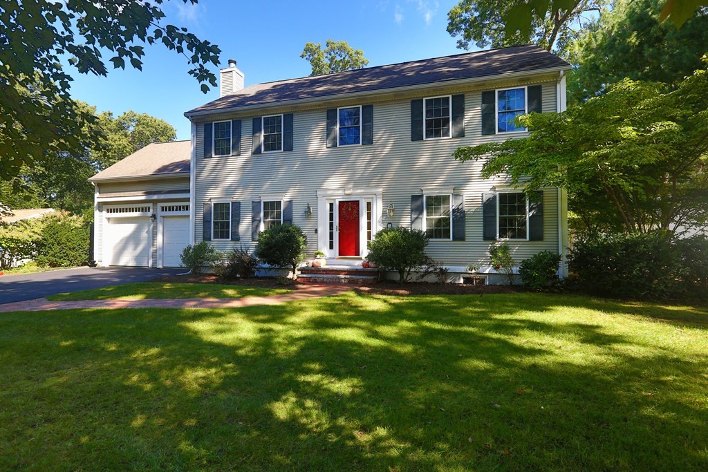 3 Magnolia Road Natick, MA 01760 - Photo 1 of 35 a front view of house with yard and green space