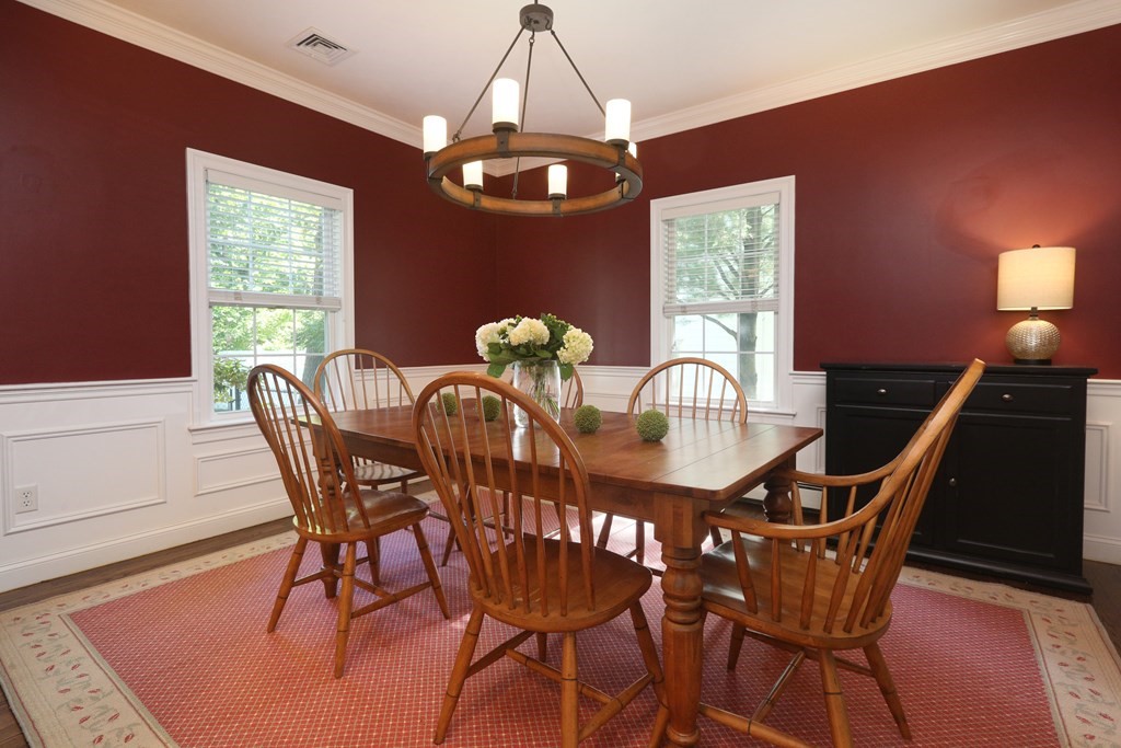 3 Magnolia Road Natick, MA 01760 - Photo 12 of 35 a dining room with furniture a chandelier and window