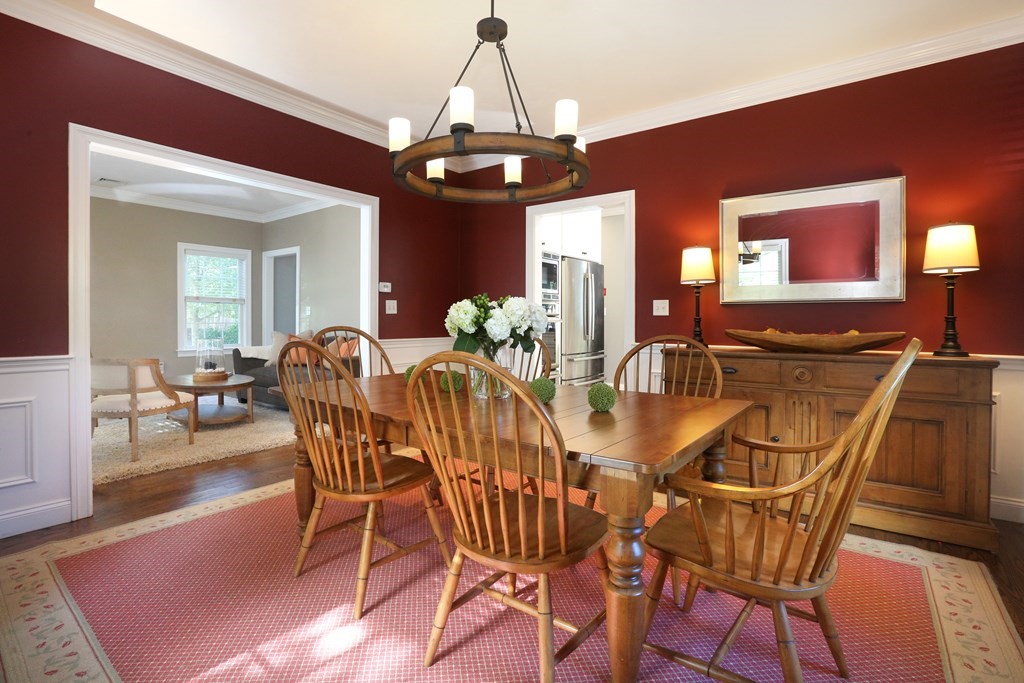 3 Magnolia Road Natick, MA 01760 - Photo 13 of 35 a view of a dining room with furniture and chandelier