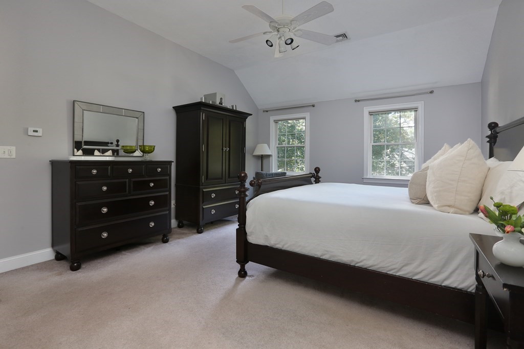 3 Magnolia Road Natick, MA 01760 - Photo 24 of 35 a bedroom with a bed and a closet