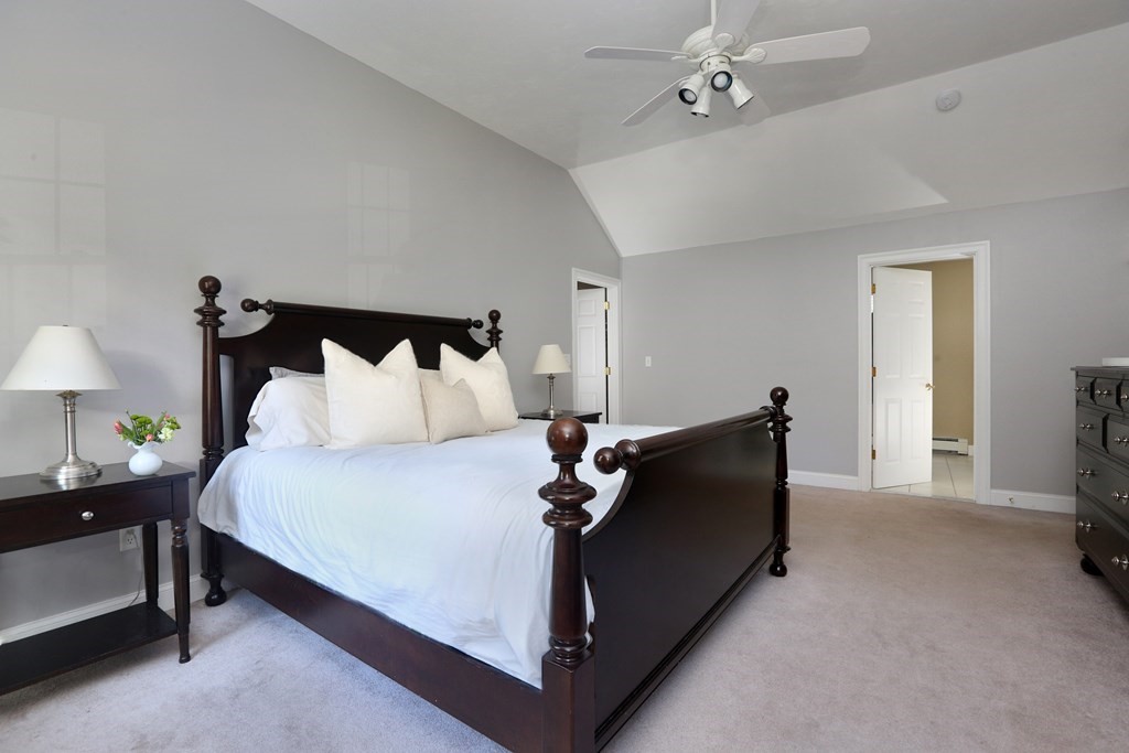 3 Magnolia Road Natick, MA 01760 - Photo 25 of 35 a bed room with a bed and a lamp