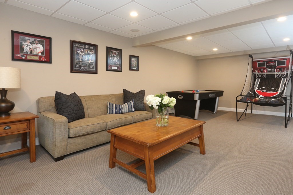 3 Magnolia Road Natick, MA 01760 - Photo 28 of 35 a living room with furniture and wall paintings
