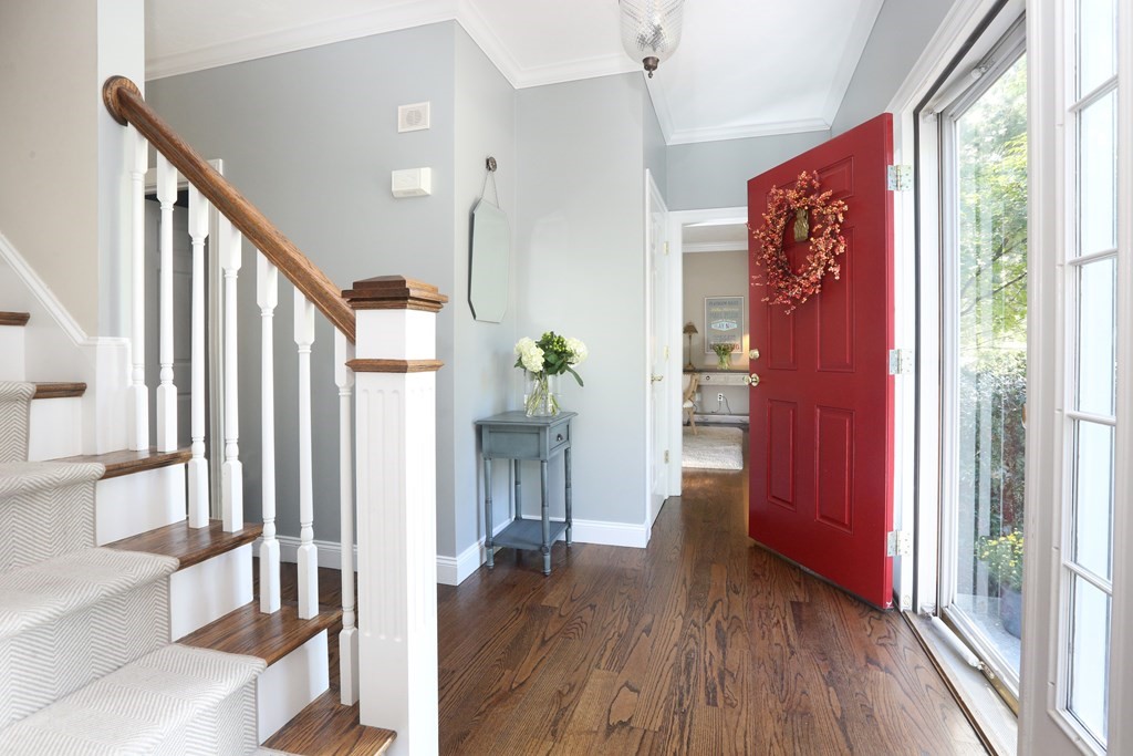 3 Magnolia Road Natick, MA 01760 - Photo 3 of 35 a view of entryway with wooden floor and windows