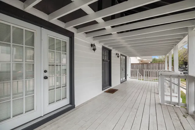 an aerial view of a house with swimming pool