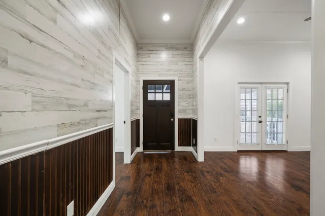 a view of gallery with wooden floor