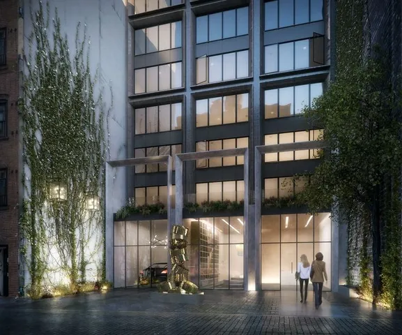 a view of a building on the street