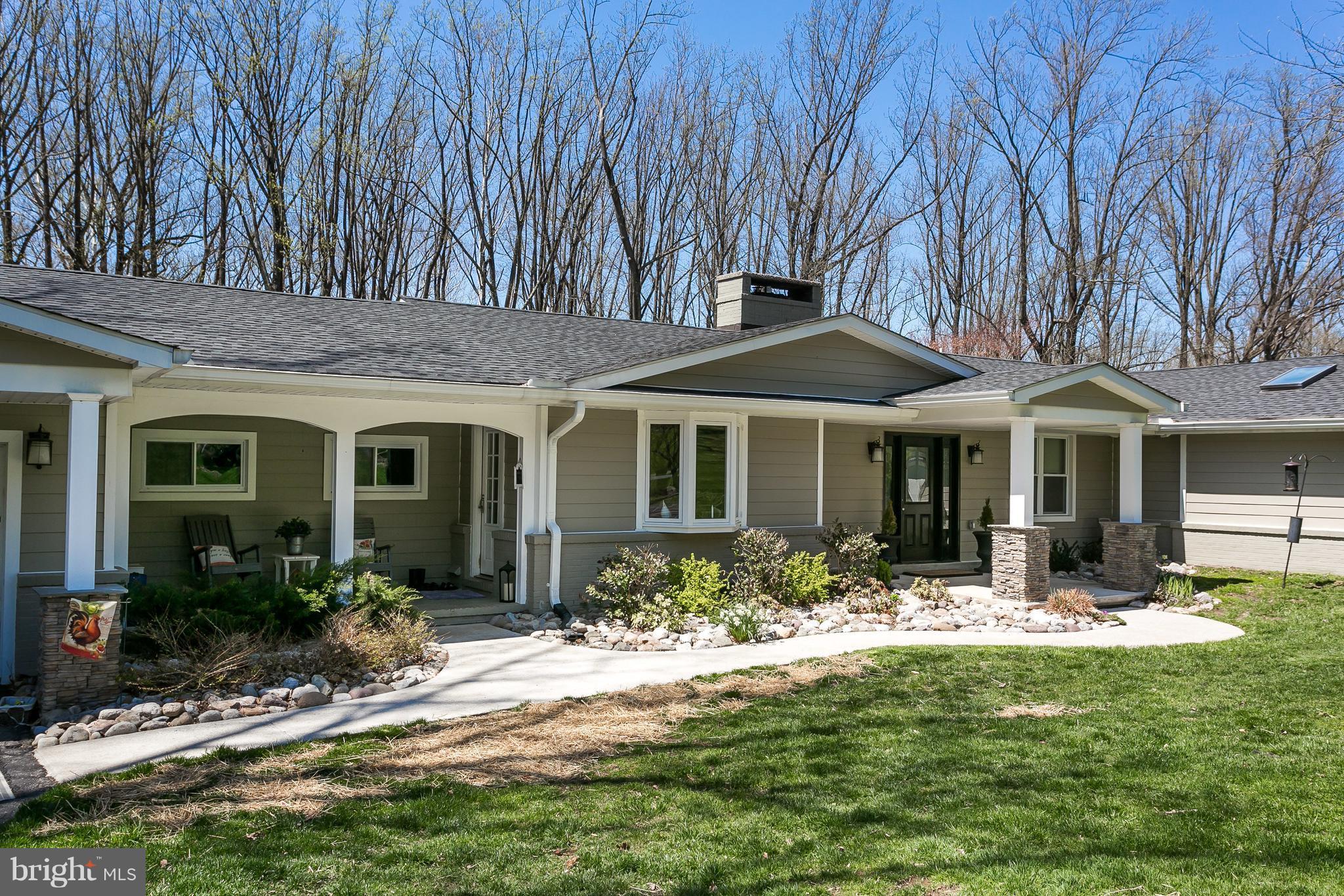 1310 Milldam Road Baltimore, MD 21286 - Photo 2 of 29 a front view of a house with swimming pool and porch