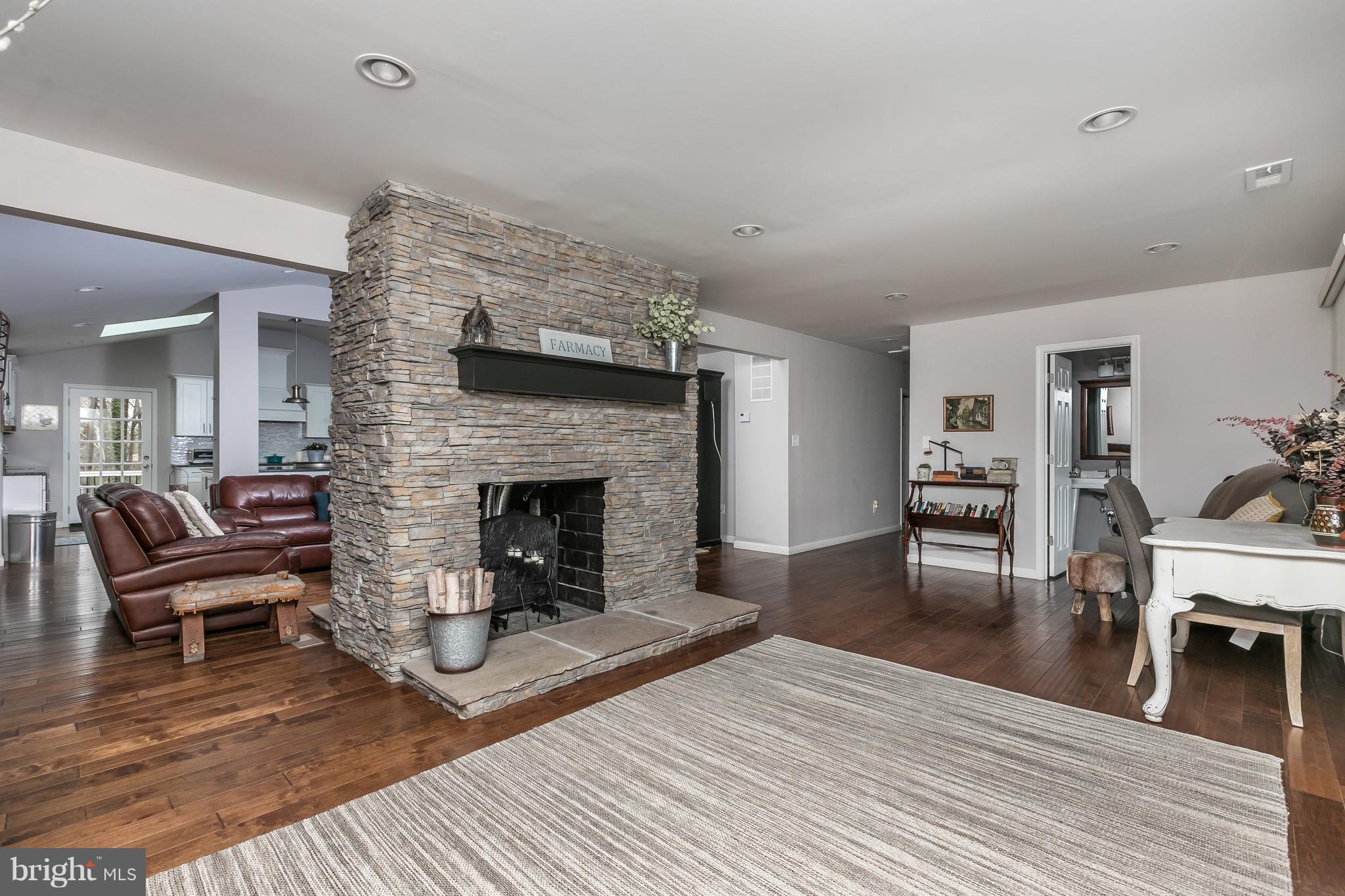 1310 Milldam Road Baltimore, MD 21286 - Photo 11 of 29 a living room with furniture and a fireplace