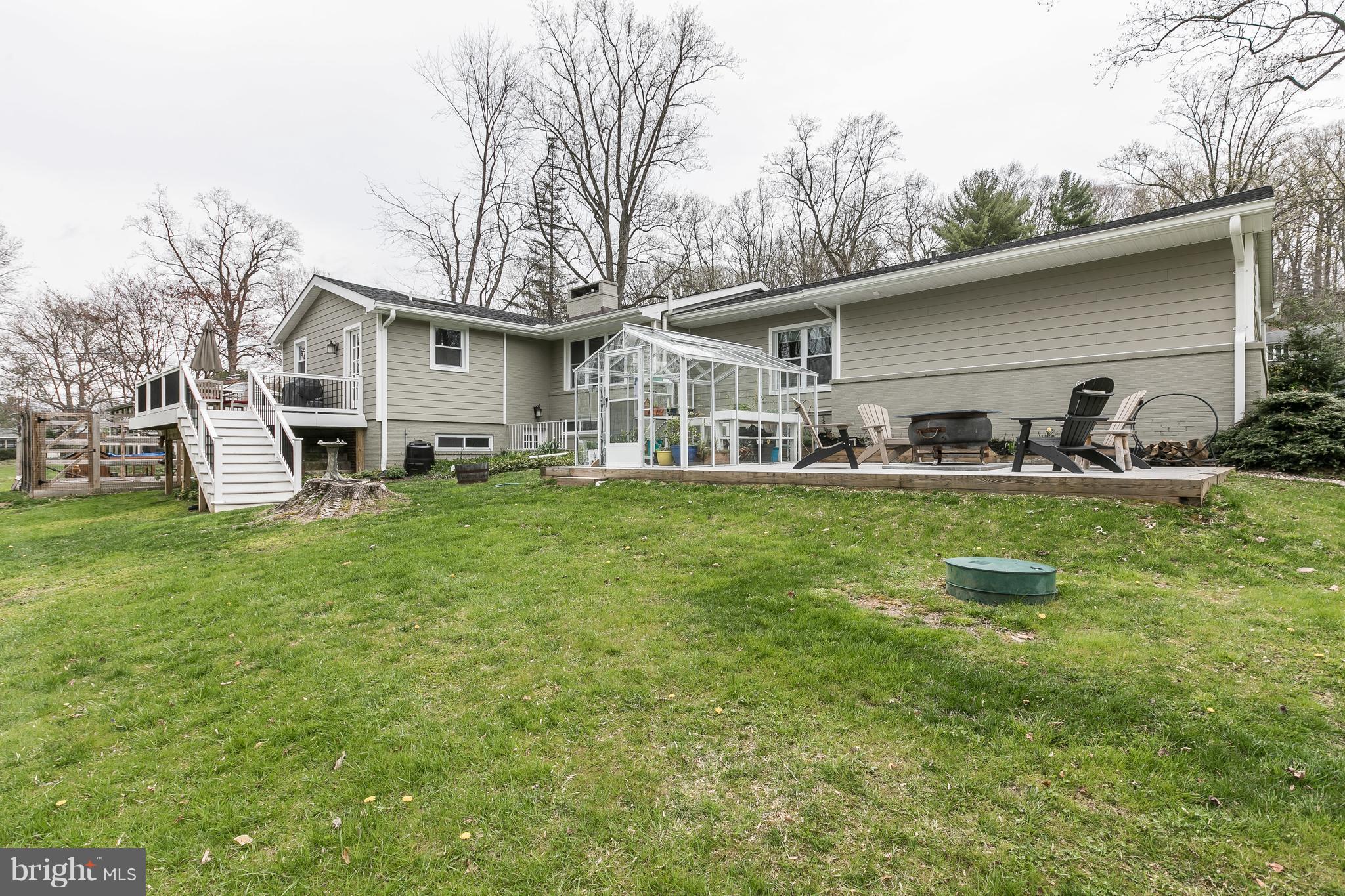 1310 Milldam Road Baltimore, MD 21286 - Photo 28 of 29 a front view of house with yard and seating area