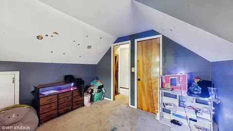 a bathroom with a sink toilet and a mirror