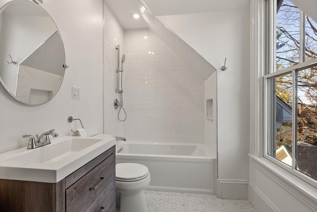 15 Sterling Street Newton, MA 02465 - Photo 26 of 39 a bathroom with a sink toilet and shower