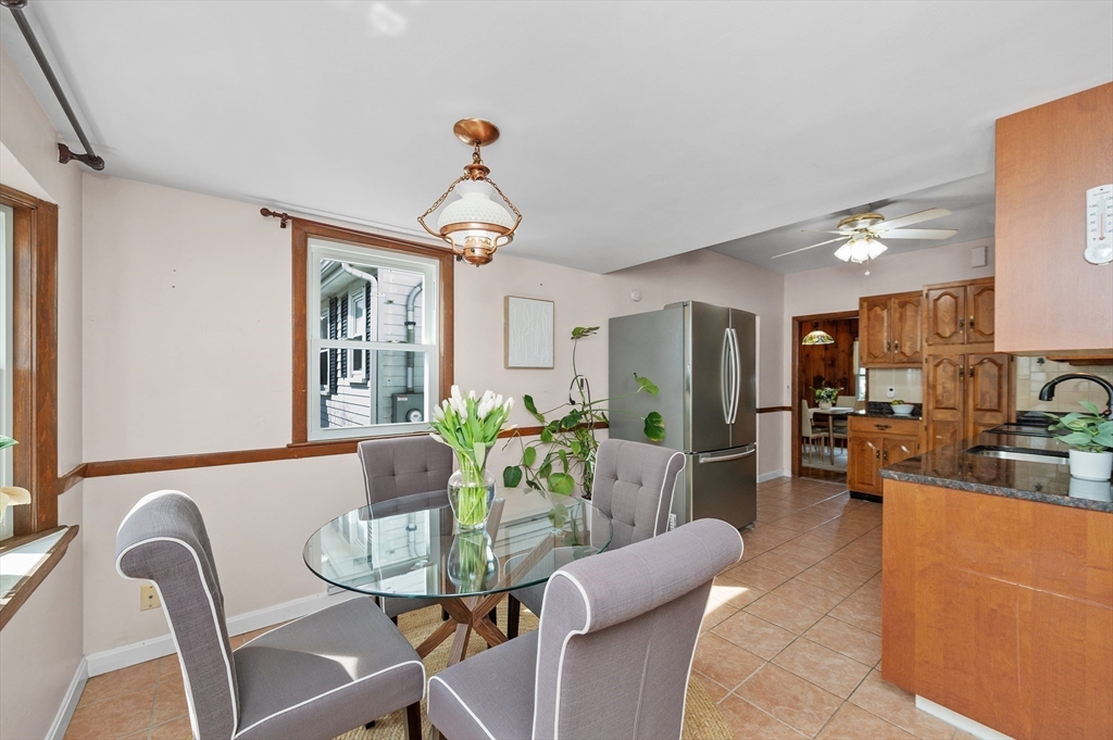 10 Parker Road Newton, MA 02459 - Photo 6 of 27 a view of a dining room with furniture