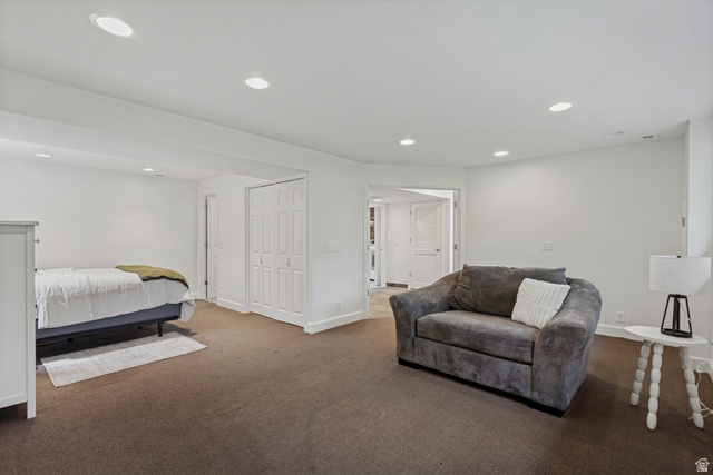 9706 Raintree Drive Sandy, UT 84092 - Photo 29 of 42 Spacious room featuring neutral carpeting, recessed ceiling lighting, and crisp white walls