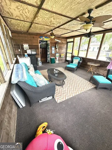 a living room filled with furniture and a couch