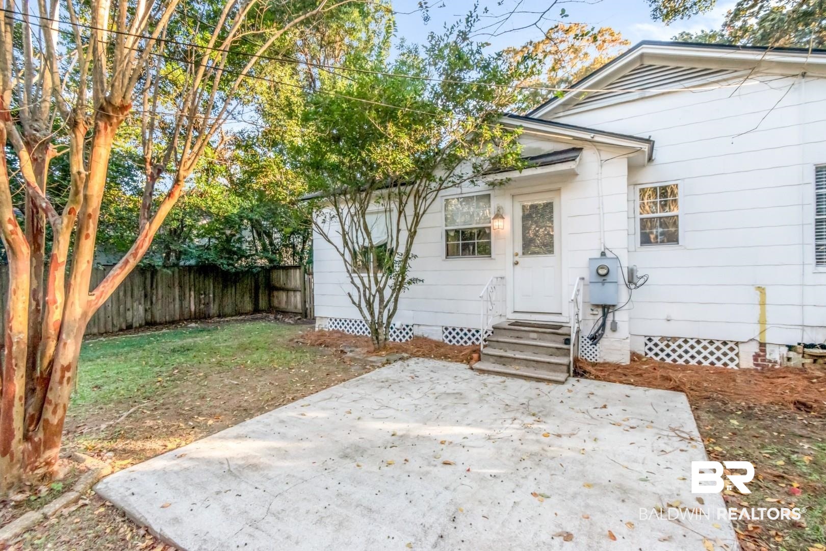 16 Princess Anne Road Mobile, AL 36608 - Photo 35 of 40 Back of property with a patio and entry steps