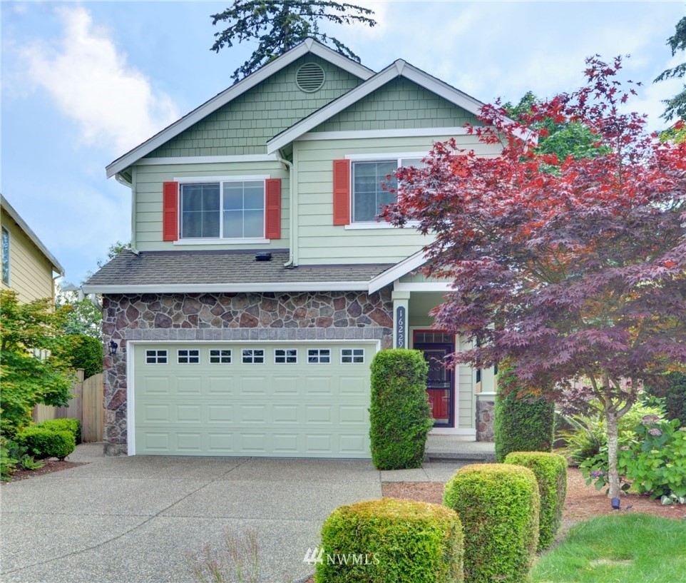 16229 35th Park Southeast Bothell, WA 98012 - Photo 1 of 23 a front view of a house with garden