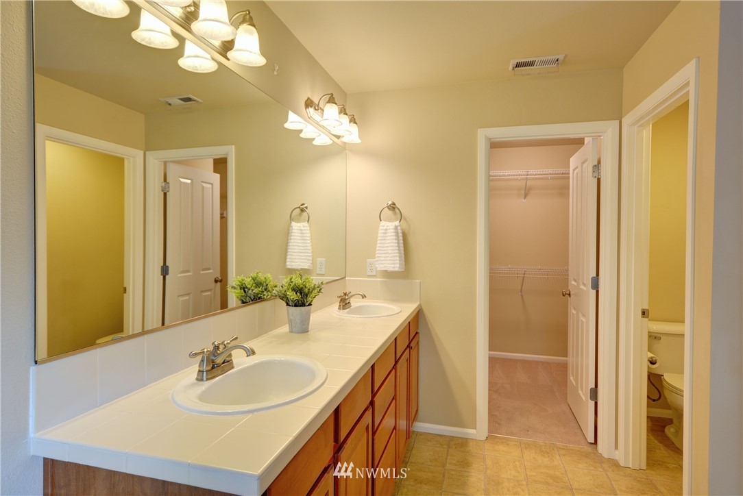 16229 35th Park Southeast Bothell, WA 98012 - Photo 13 of 23 a bathroom with a sink double vanity and a mirror