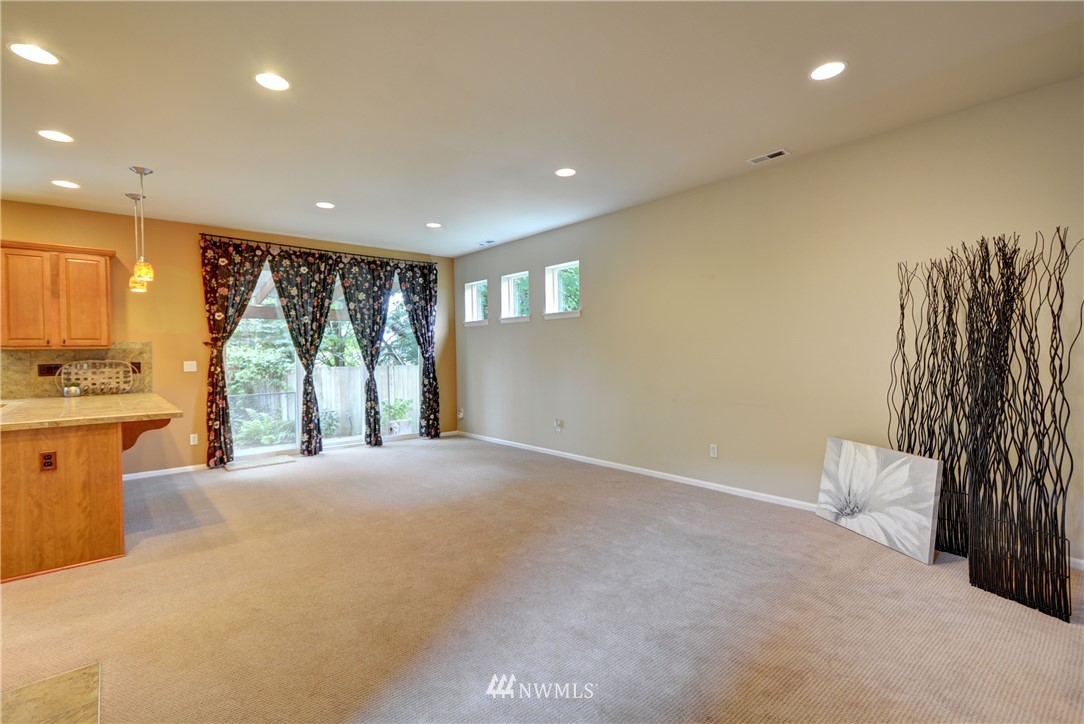 16229 35th Park Southeast Bothell, WA 98012 - Photo 4 of 23 a big room with windows and a bathroom