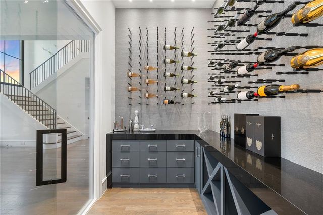 a kitchen with stainless steel appliances a refrigerator and a stove