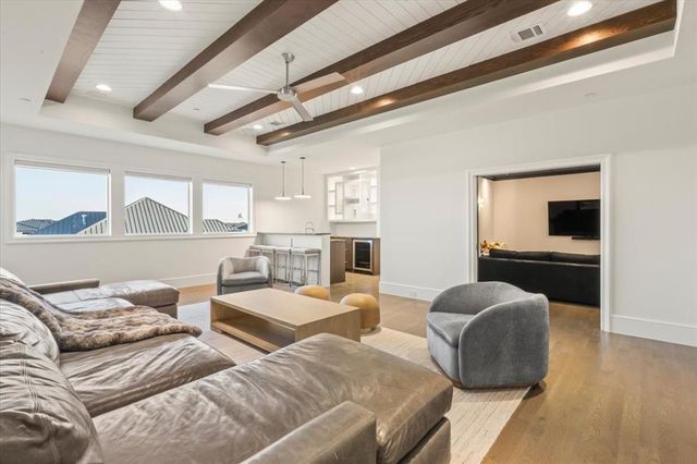 a bedroom with furniture and a window