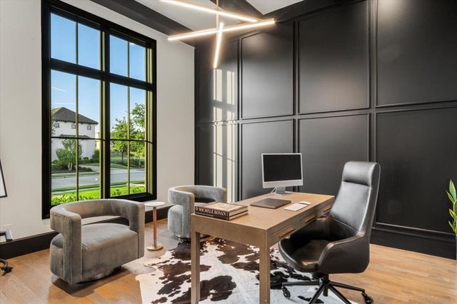a view of a livingroom with furniture and a table
