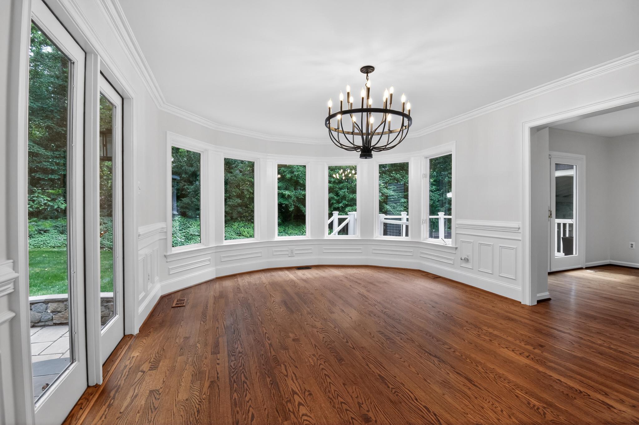 11728 Stuart Mill Road Oakton, VA 22124 - Photo 14 of 68 Sunlit elegance breakfast room in a curved space.