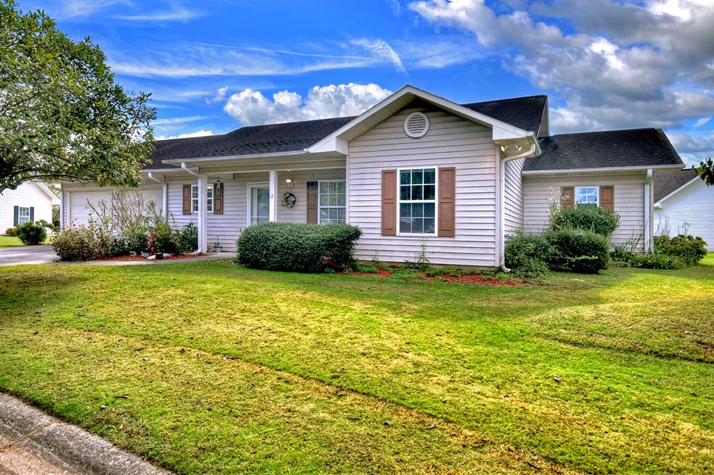 12 Sunset Court Blue Ridge, GA 30513 - Photo 1 of 23 a front view of a house with garden
