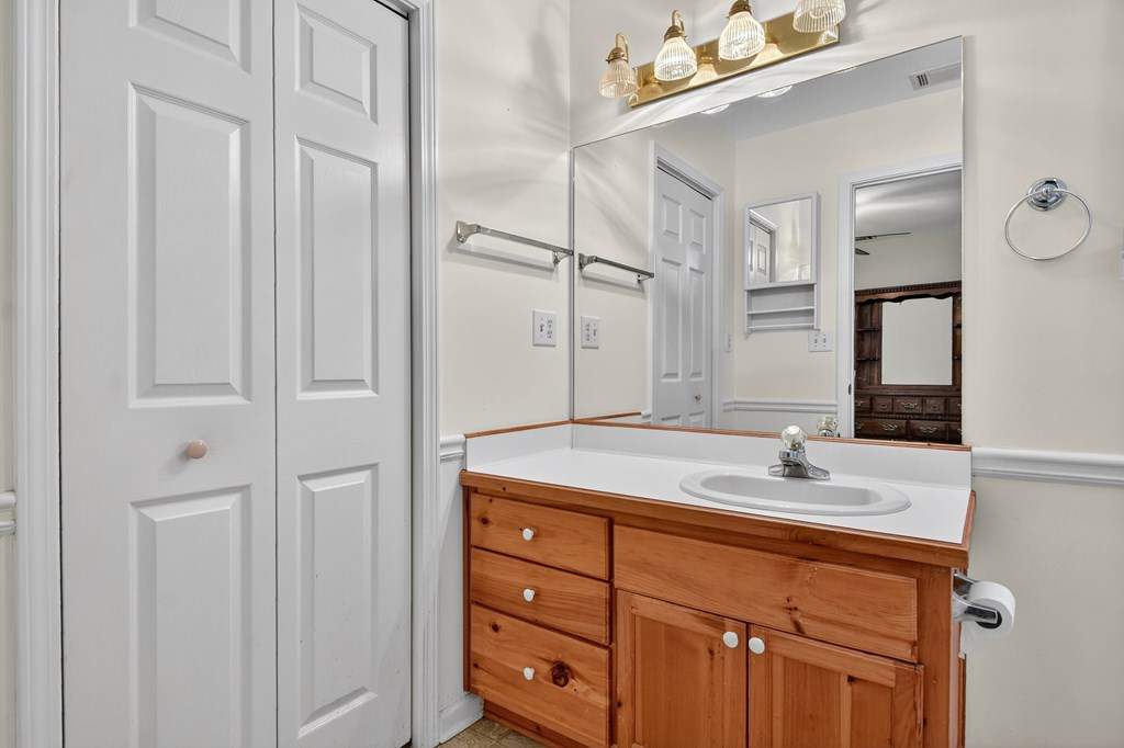 12 Sunset Court Blue Ridge, GA 30513 - Photo 17 of 23 a bathroom with a sink and a mirror