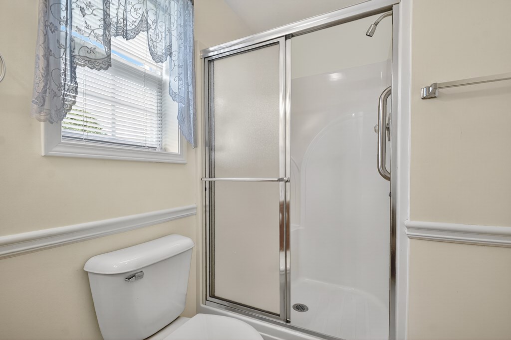 12 Sunset Court Blue Ridge, GA 30513 - Photo 18 of 23 a bathroom with a shower and a toilet