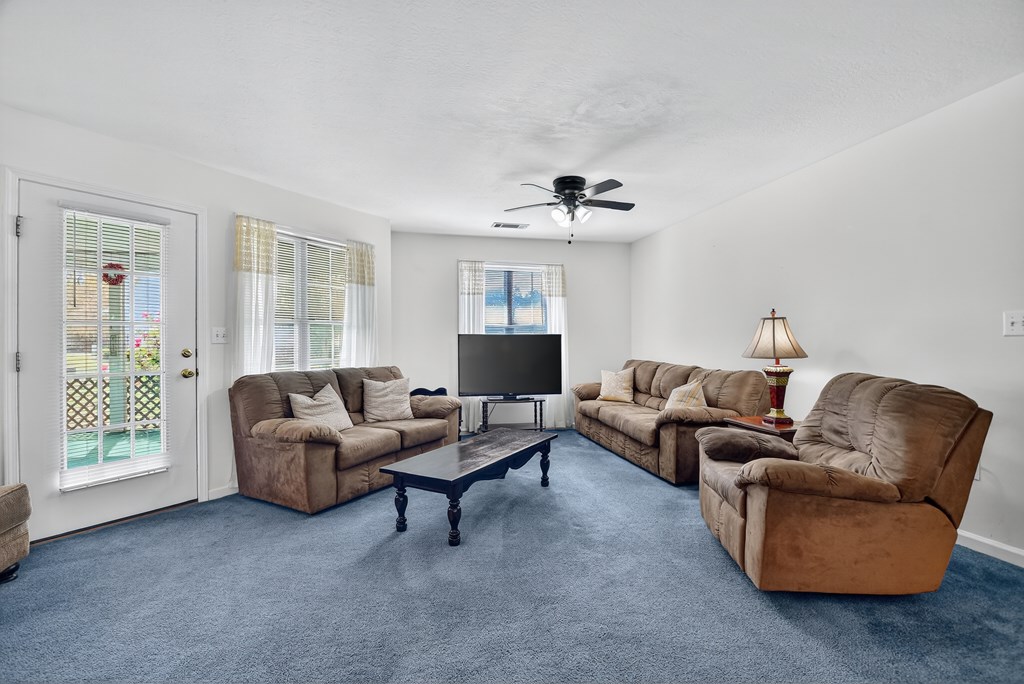 12 Sunset Court Blue Ridge, GA 30513 - Photo 5 of 23 a living room with furniture and a window