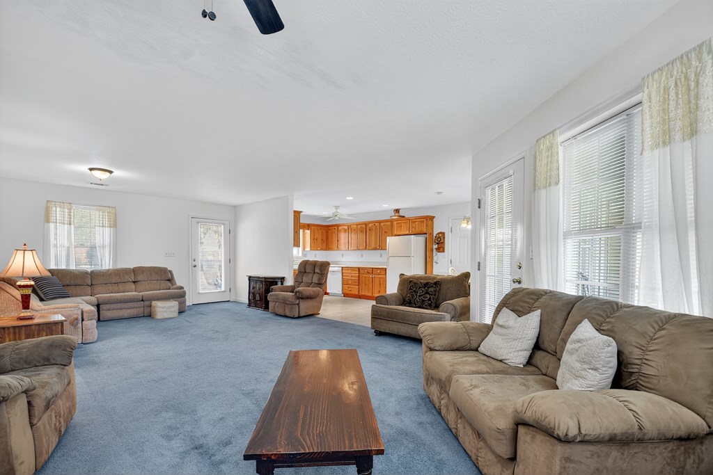 12 Sunset Court Blue Ridge, GA 30513 - Photo 7 of 23 a living room with furniture and a large window